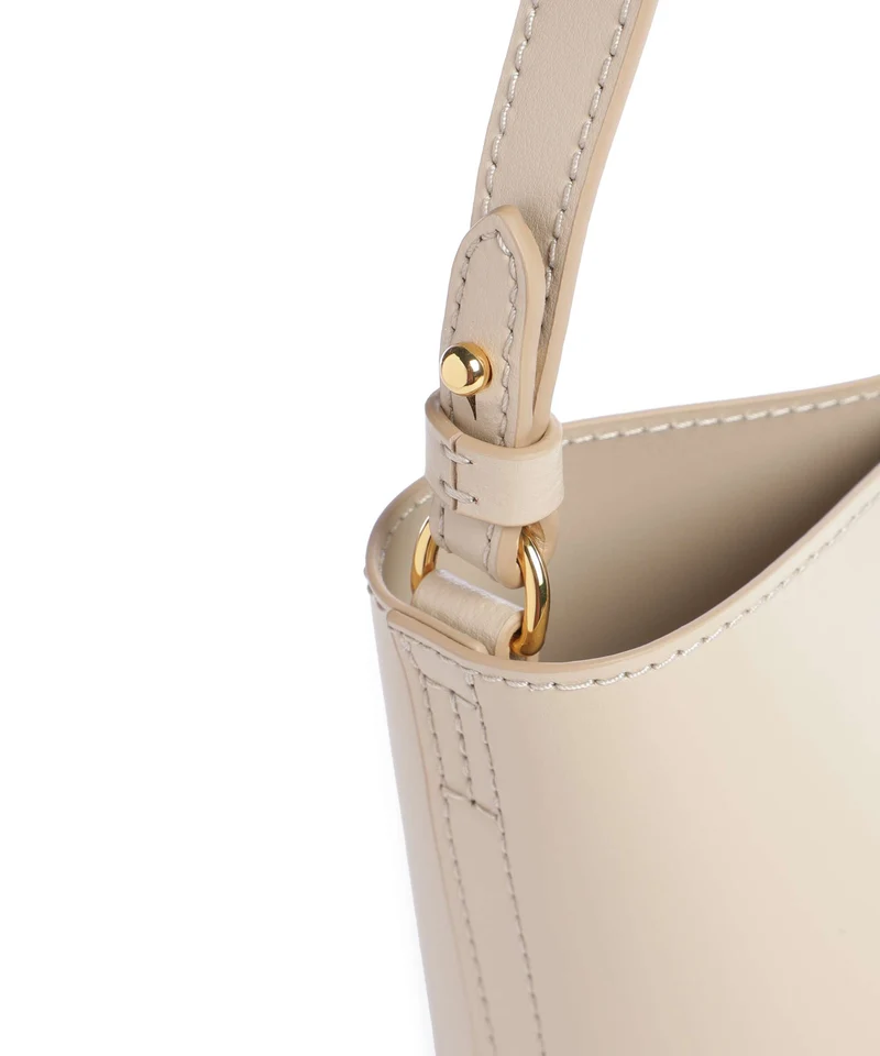 Coccinelle Nikla Monogram Sangallo Bucket Handtasche sandshell
