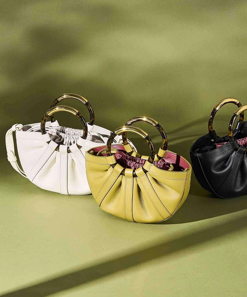 Coccinelle Shell Handtasche seagrass