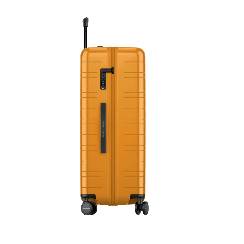 H7 / Glossy Bright Amber / Premium Multi Shell / Check-In Size L / Essential