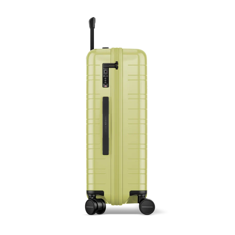 H6 / Glossy Dusk Yellow / Premium Hard Shell / Check-In Size M / Essential